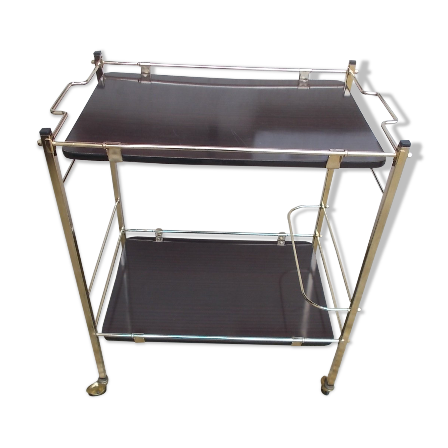 Rolling serving table in brass