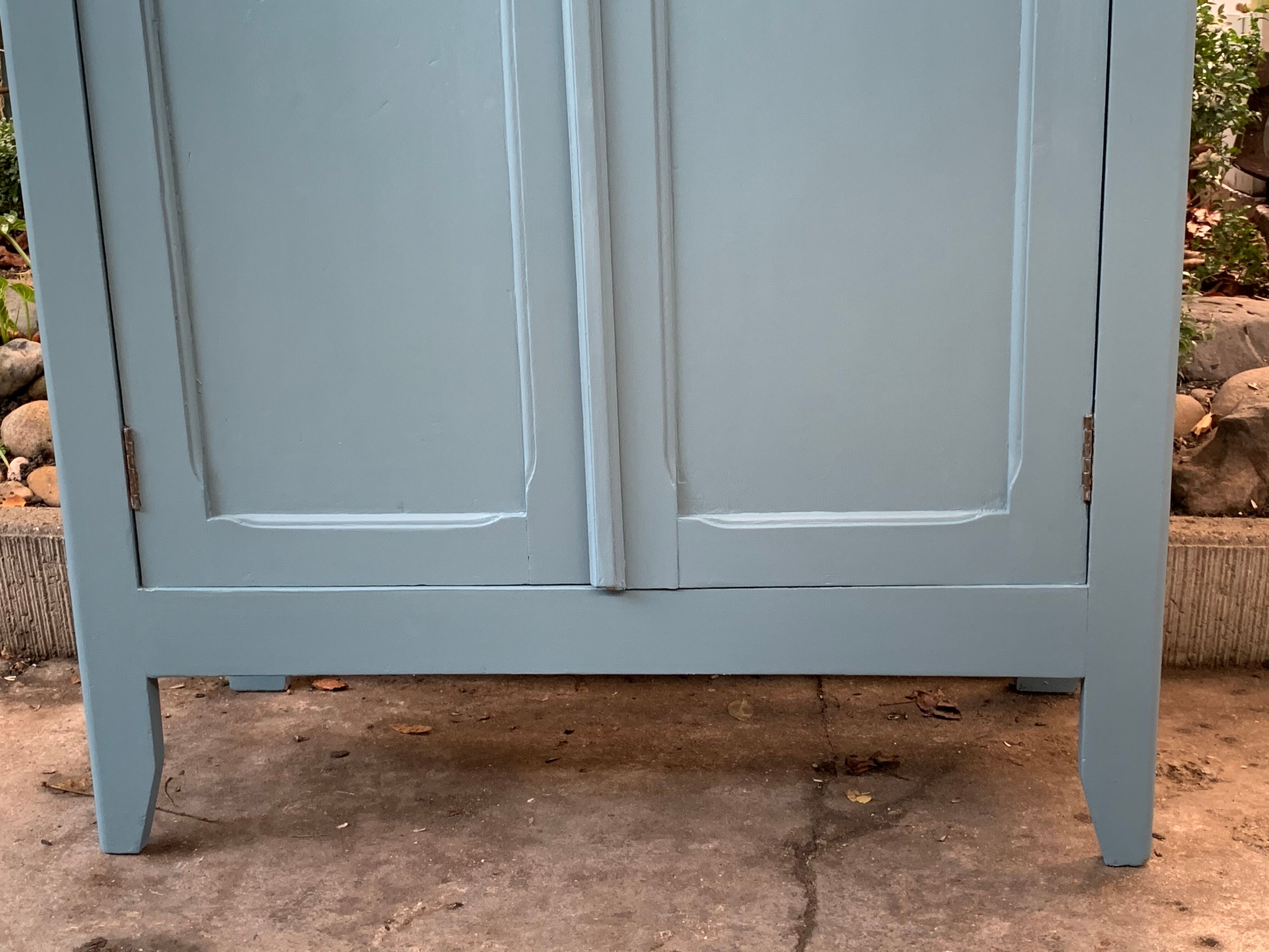 Blue grey parisian wardrobe