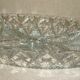 Oval compartmentalized plate in transparent glass