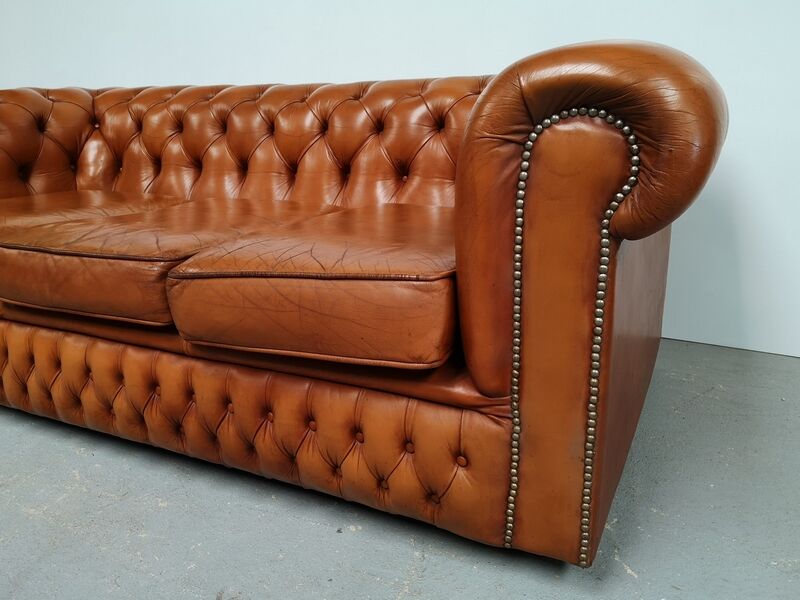 Light brown leather chesterfield sofa