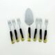 Art déco cake lifter and 6 cake forks black bakelite and lucite cake set