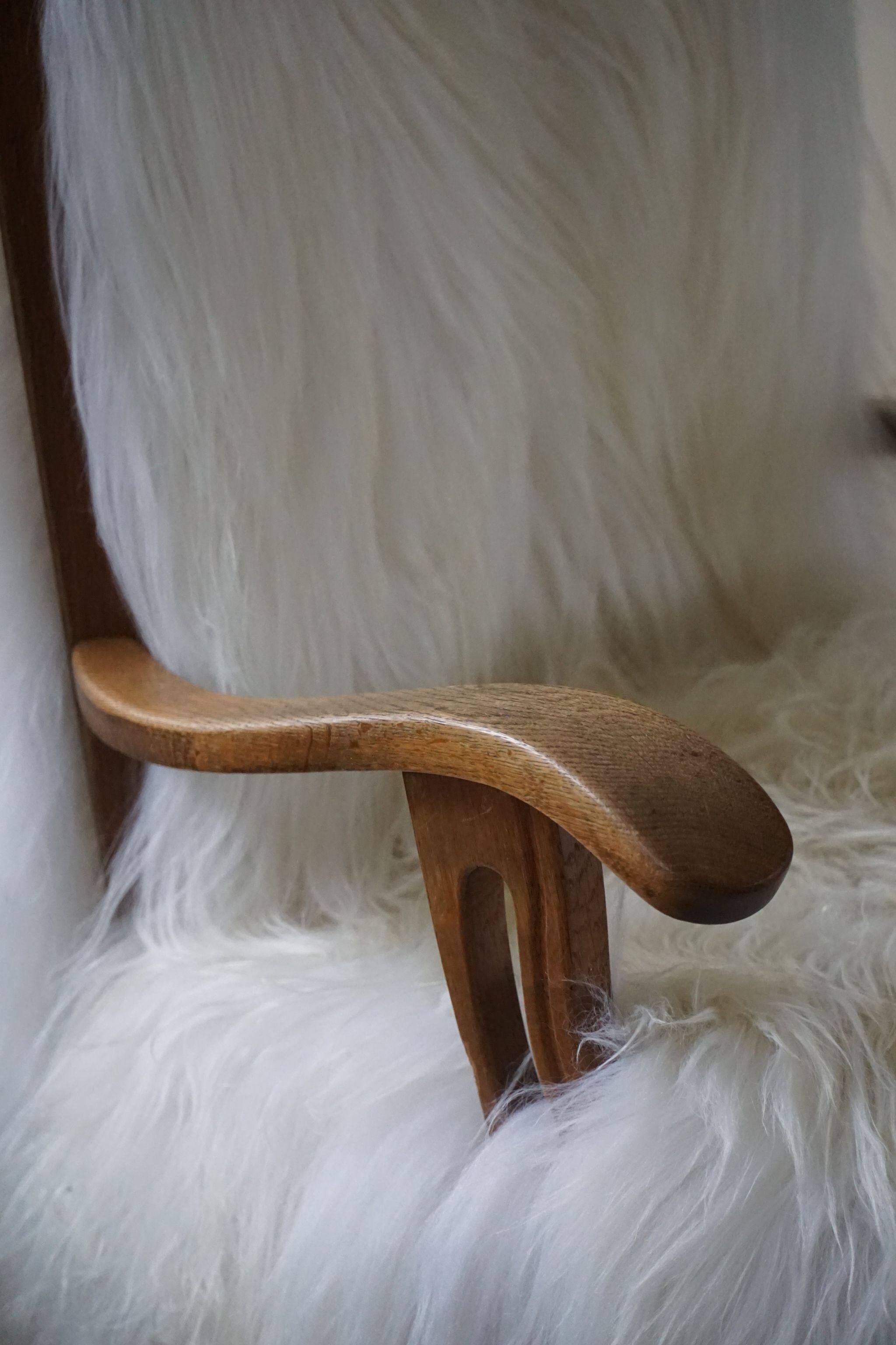 Henning Kjærnulf, armchair reupholstered in long-haired Icelandic sheepskin, 1950