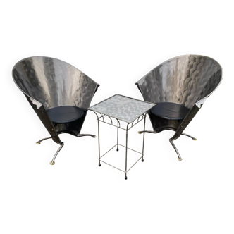 2 cone chairs and a table by Steel-Line