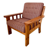 Old vintage Scandinavian design pine armchair from the 70s