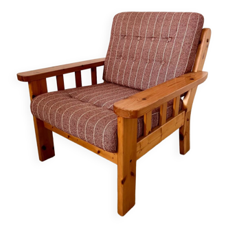 Old vintage Scandinavian design pine armchair from the 70s