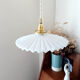 Serrated opaline suspension
