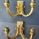 Pair of bronze wall sconces with 1940s Art Deco lampshades.