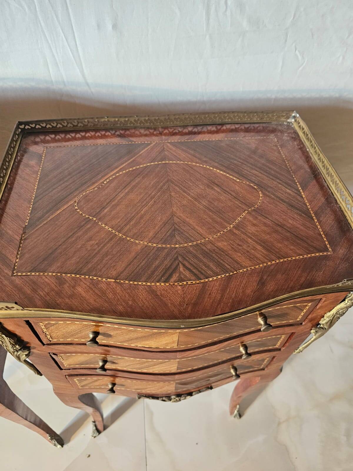 Pair of Louis XV style bedside tables in marquetry