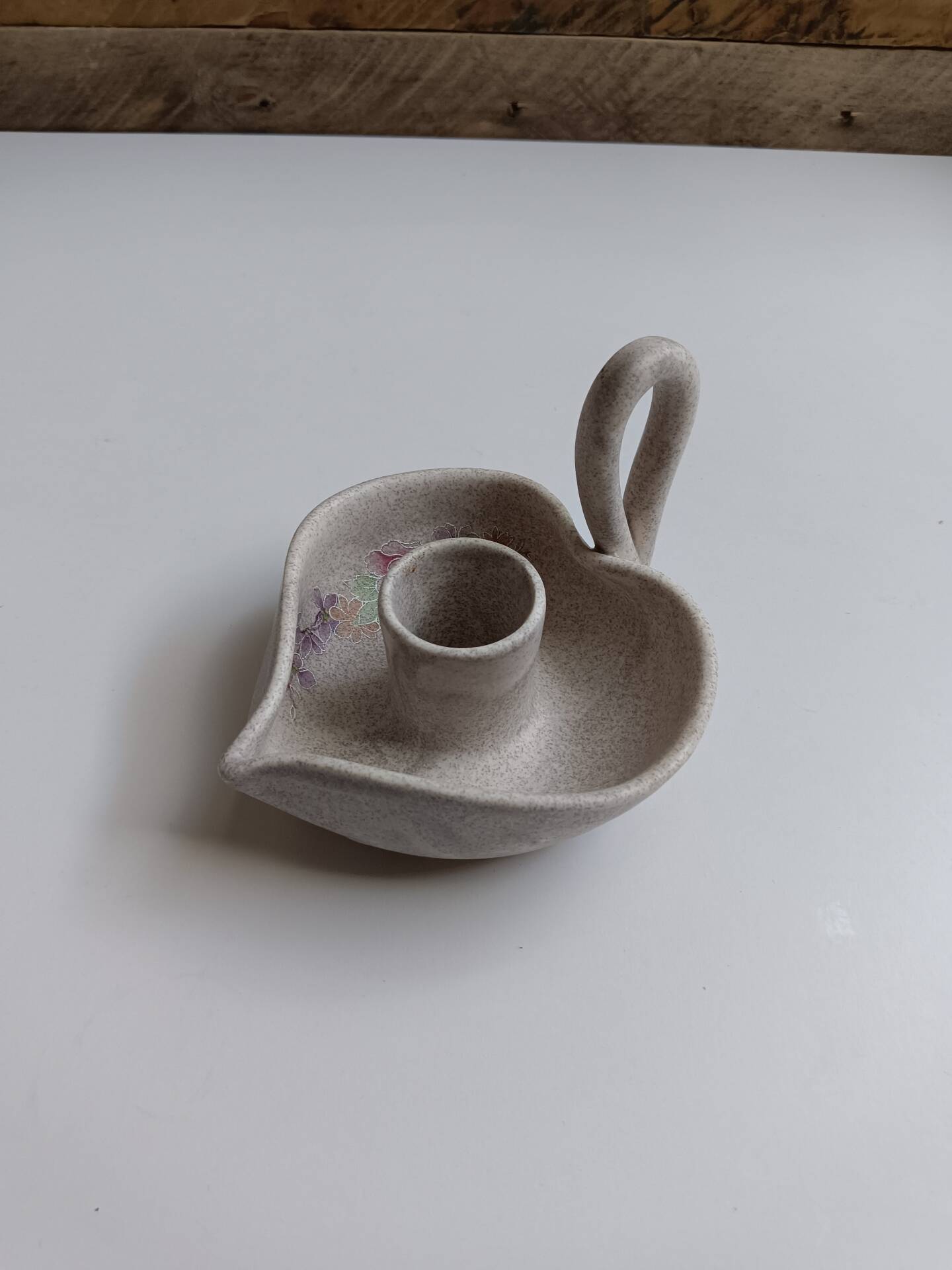 Vallauris grey candle holder with pink flowers, signed.