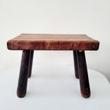 Old small solid wood milking stool