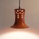 Mid century pendant light with orange ceramic shade 1970s