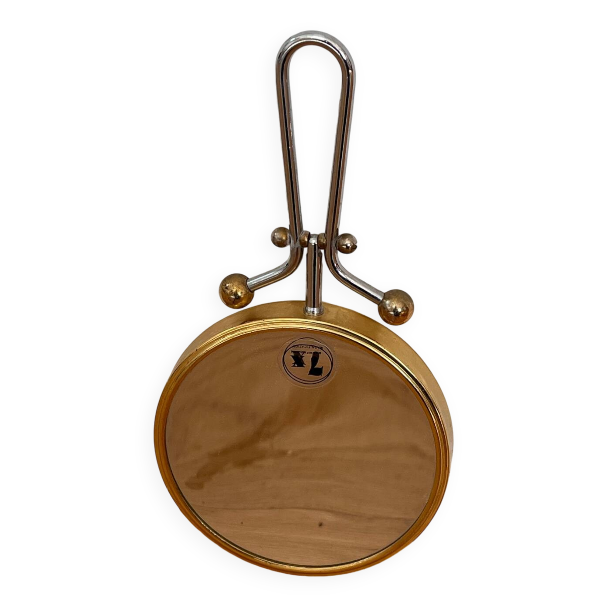 Magnifying brass mirror