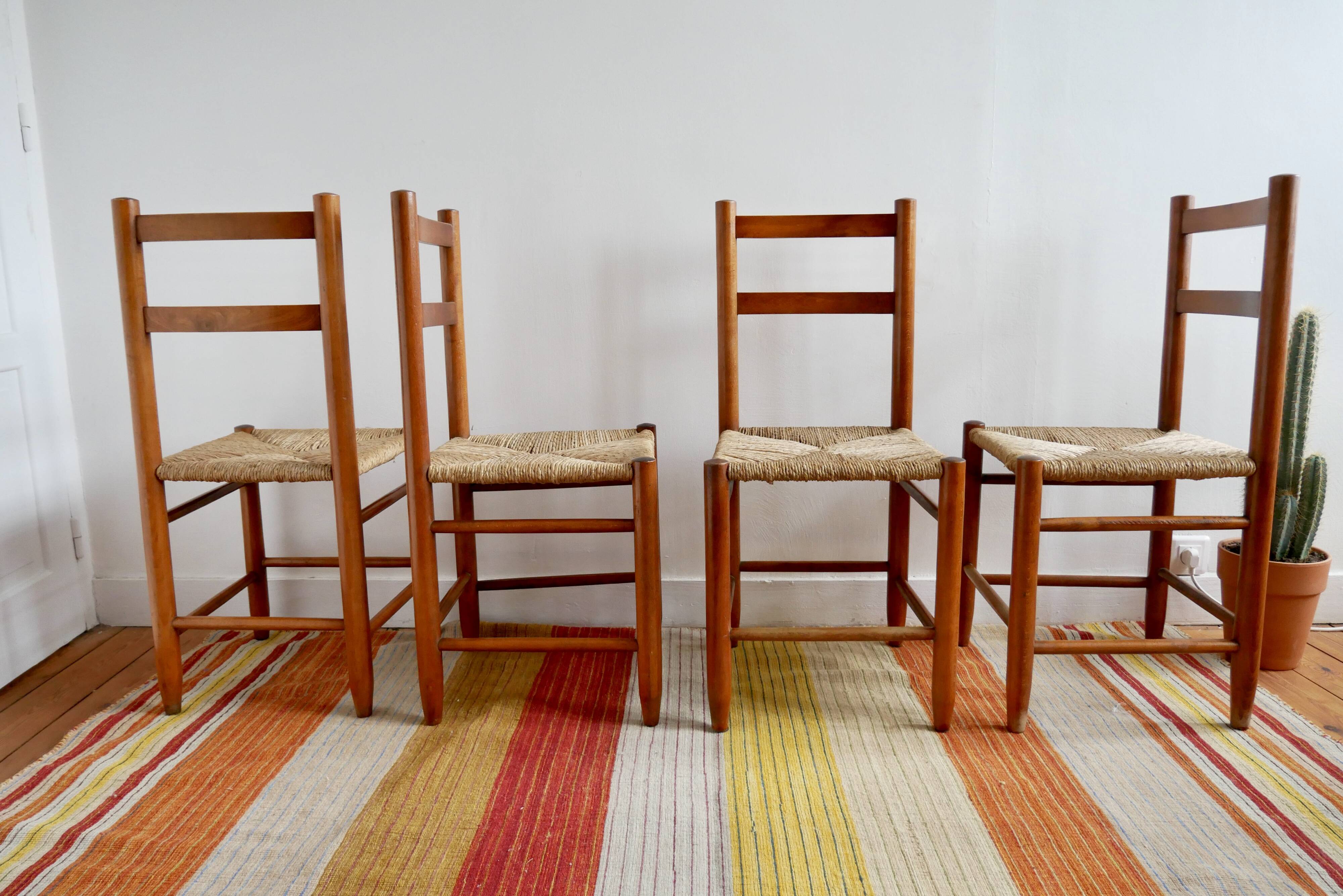 Set of 4 straw chairs and a stool