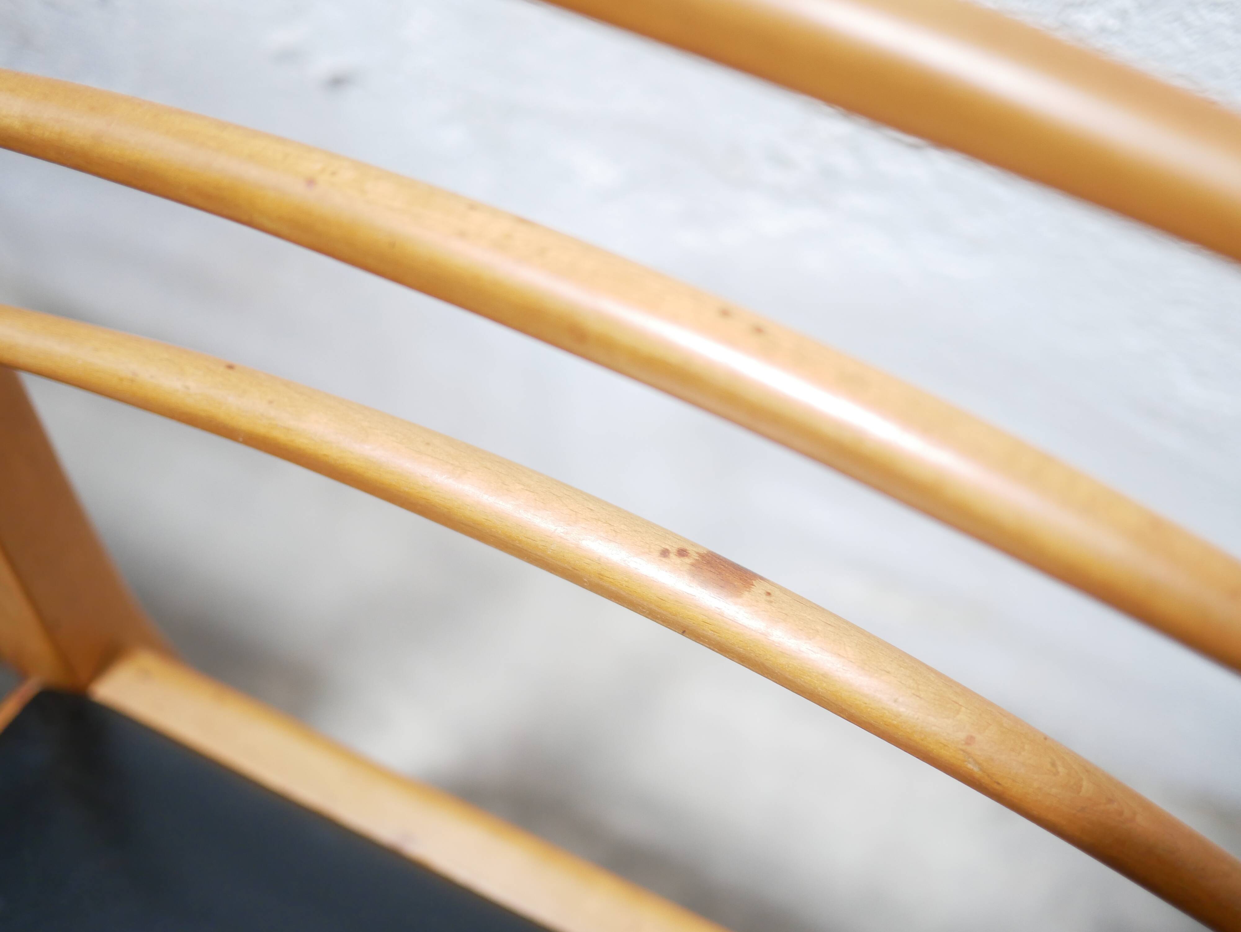Series of 4 vintage chairs in wood and skaï