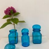 Trio of vintage turquoise blue glass jars