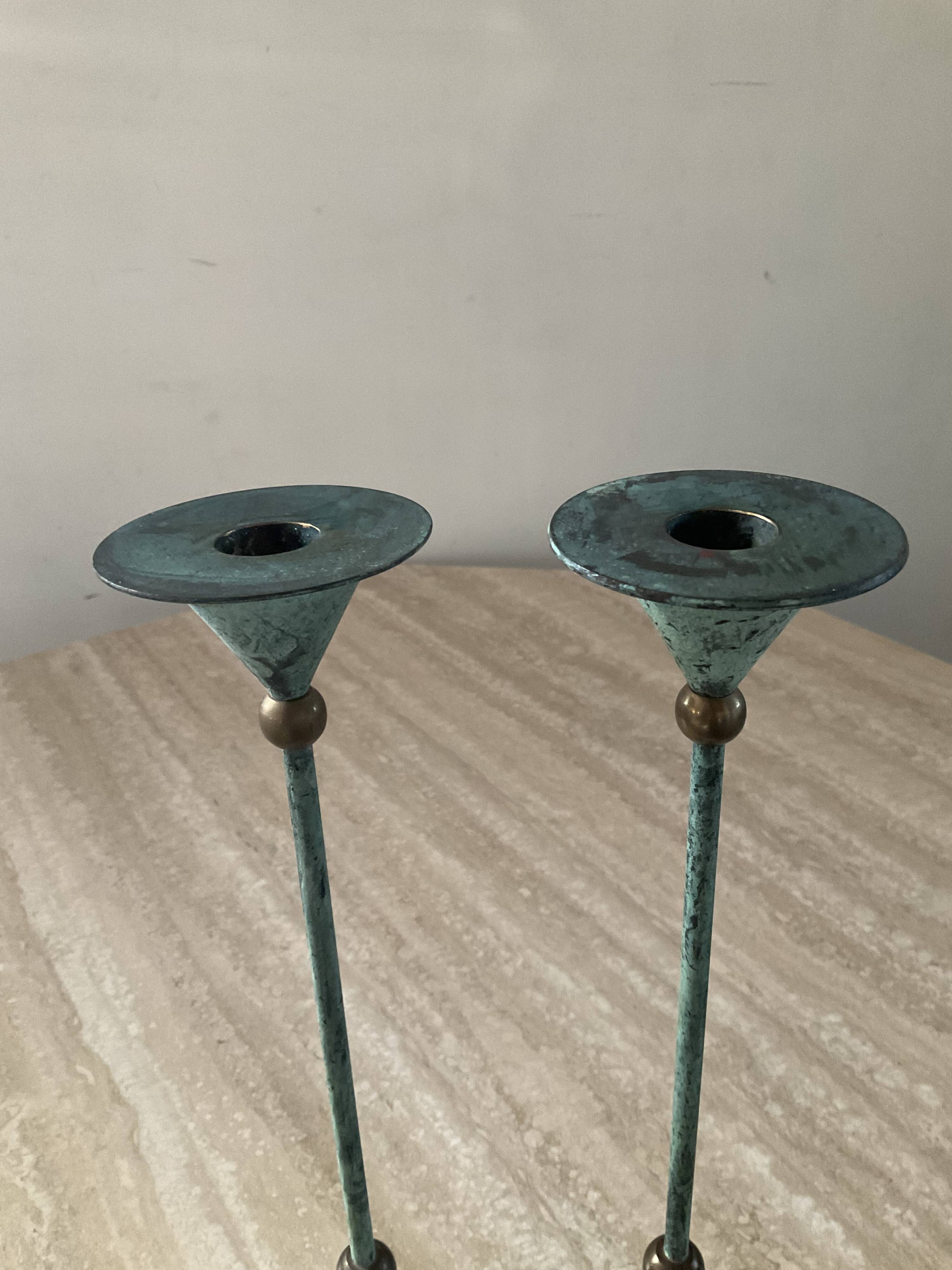Pair of vintage brass and metal candlesticks