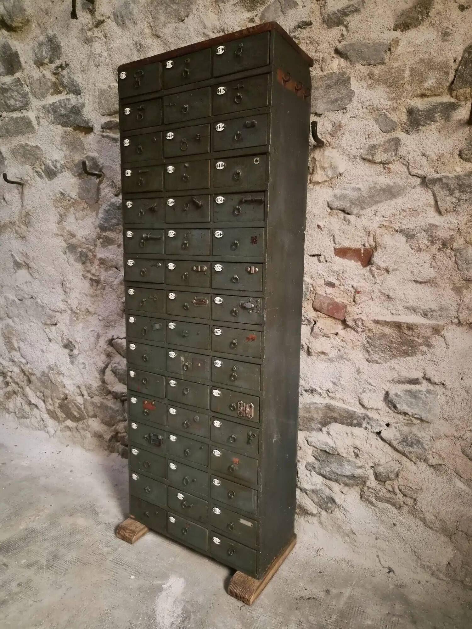 Antique hardware cabinet with 48 drawers, circa 1900.