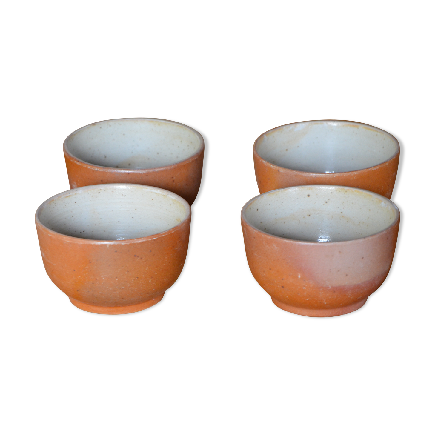 Lot of 4 bowls in sandstone and shiny grey inside