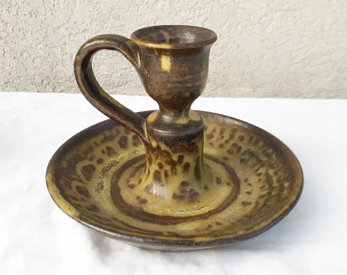 Pair of stoneware candlesticks