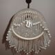 Vintage suspension in half shell speckled with pearls
