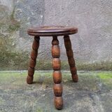 Turned wooden tripod stool