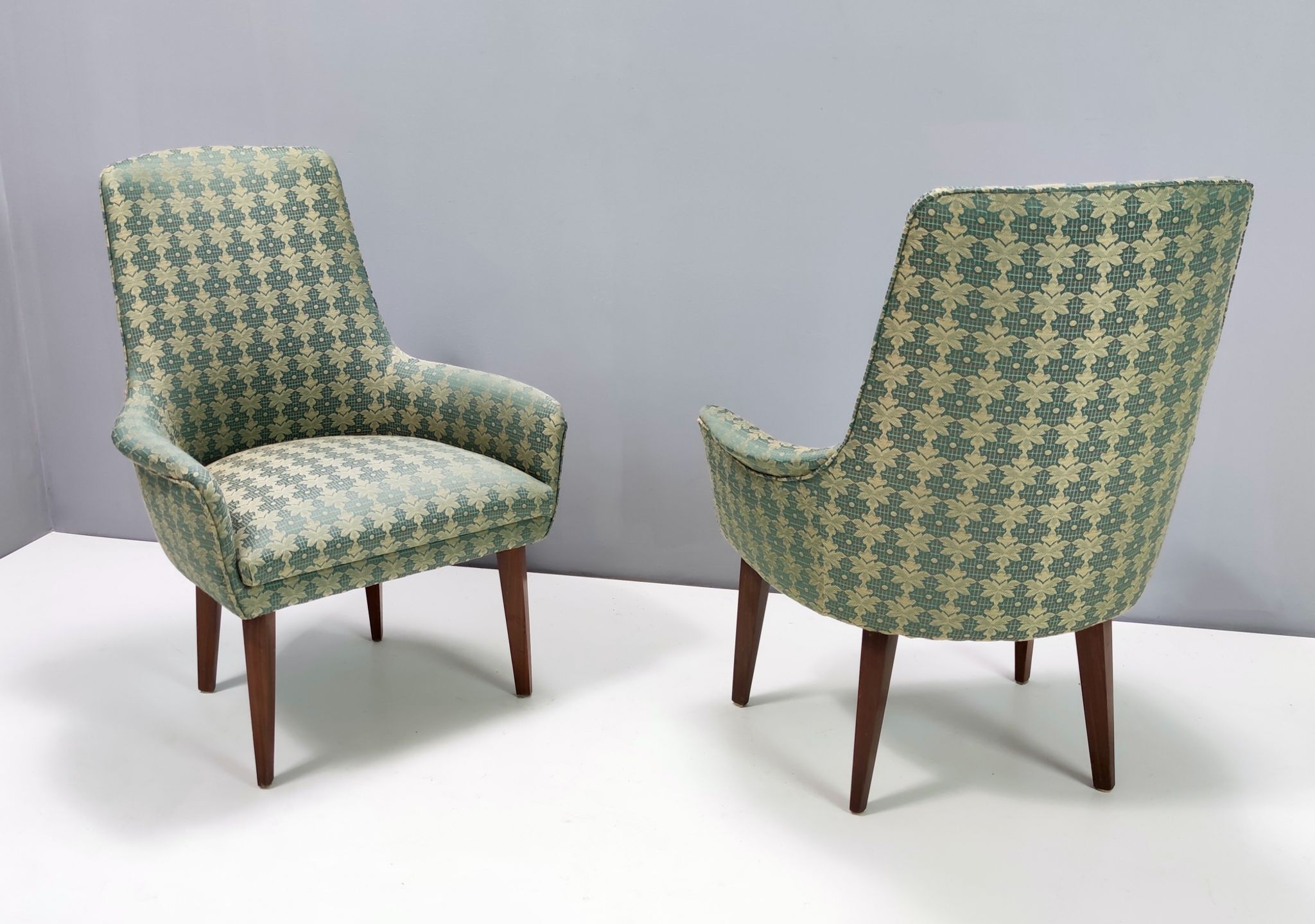 Green fabric and beech armchairs, italy