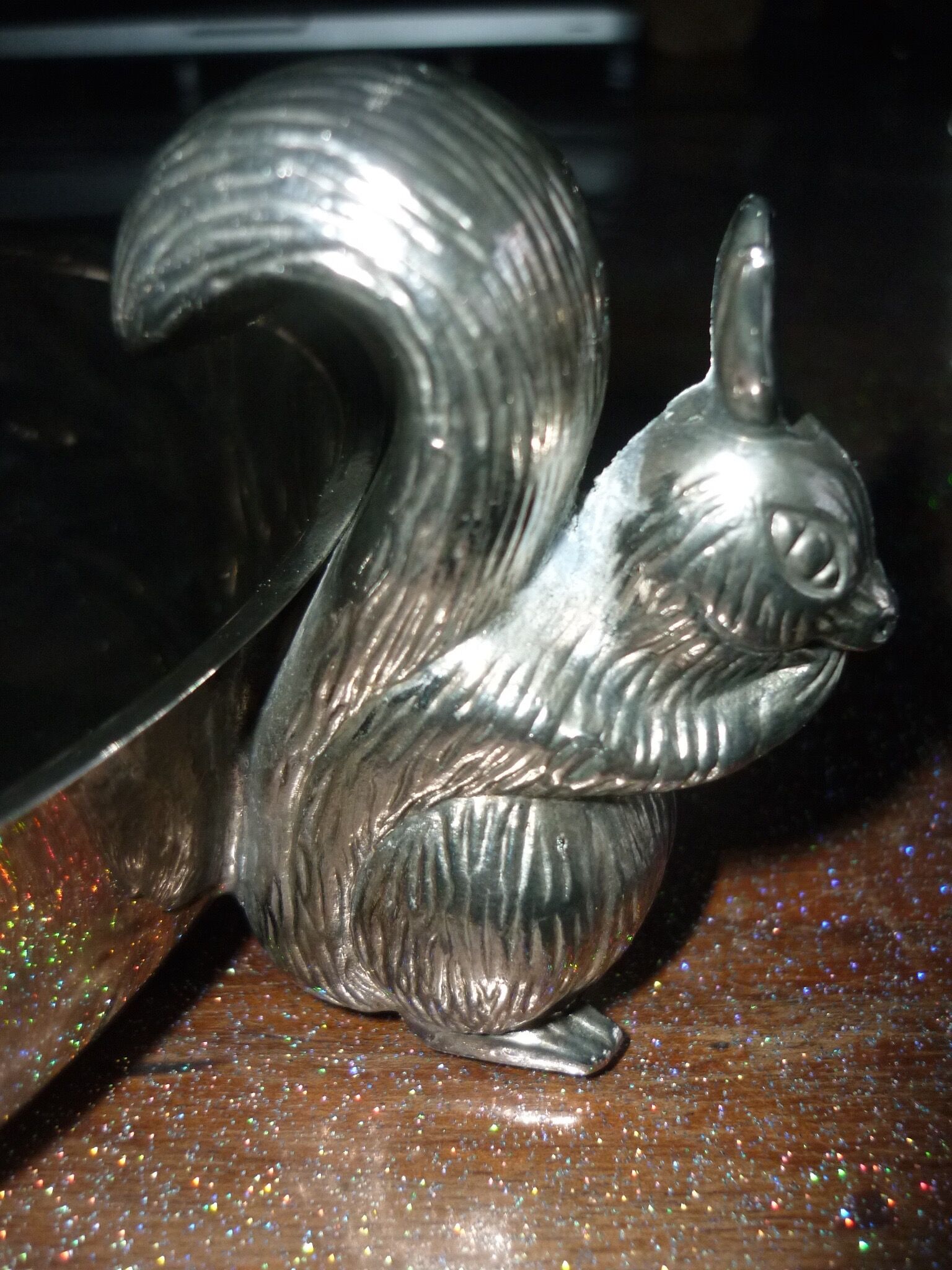 Silver metal dish with squirrels