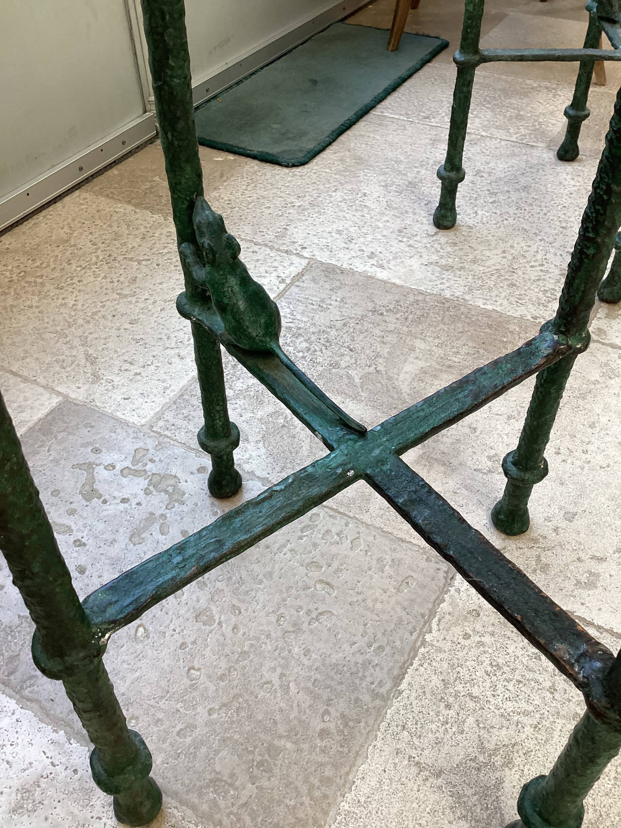 Pair of patinated bronze stools in the spirit of Giacometti.