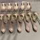 Suite of 12 small silver metal spoons in Louis XV style