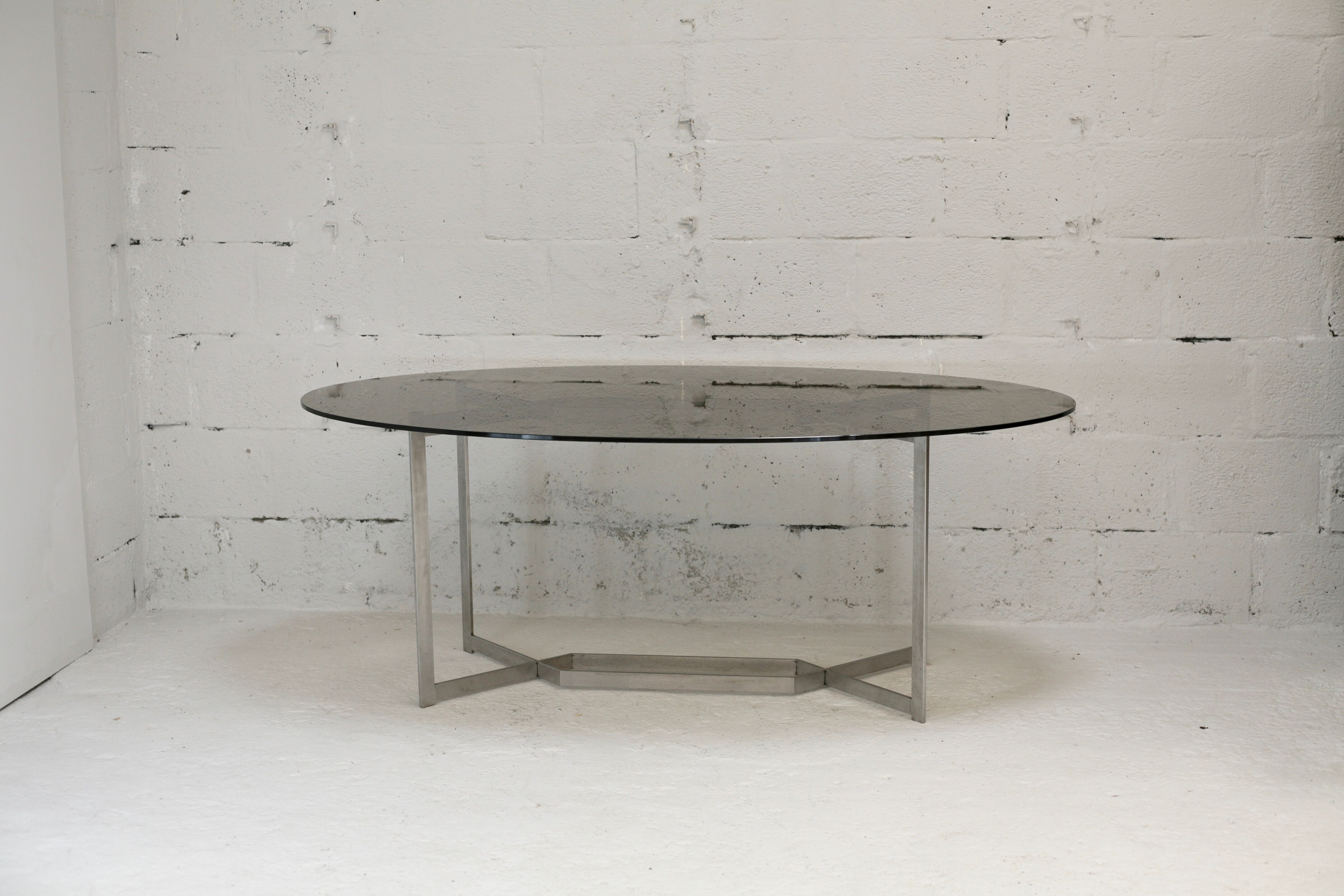 Table de Paul Legard, édition DOM, aluminium brossé et dalle elliptique de verre fumé, France, circa