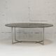 Table de Paul Legard, édition DOM, aluminium brossé et dalle elliptique de verre fumé, France, circa