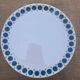 Vintage Thomas Germany flat plates, geometric blue rosette design.