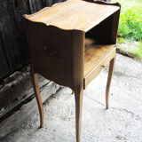 Old wooden bedside table heart pattern