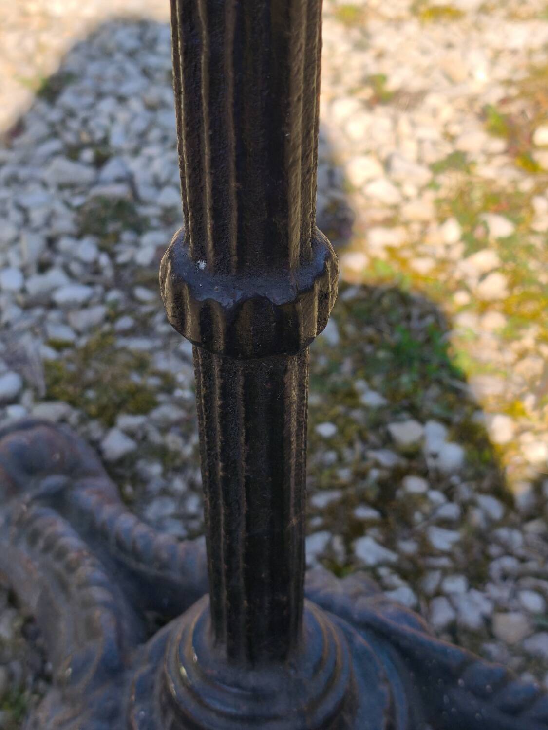 Marble bistro table with cast iron legs in Parisian café style
