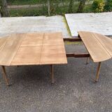 Renovated Louis Philippe round extendable dining table with leaves from the 18th century.