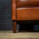 Chaise club en cuir de mouton