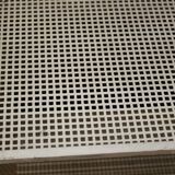 Dedal shelf by Mathieu Matégot in perforated iron