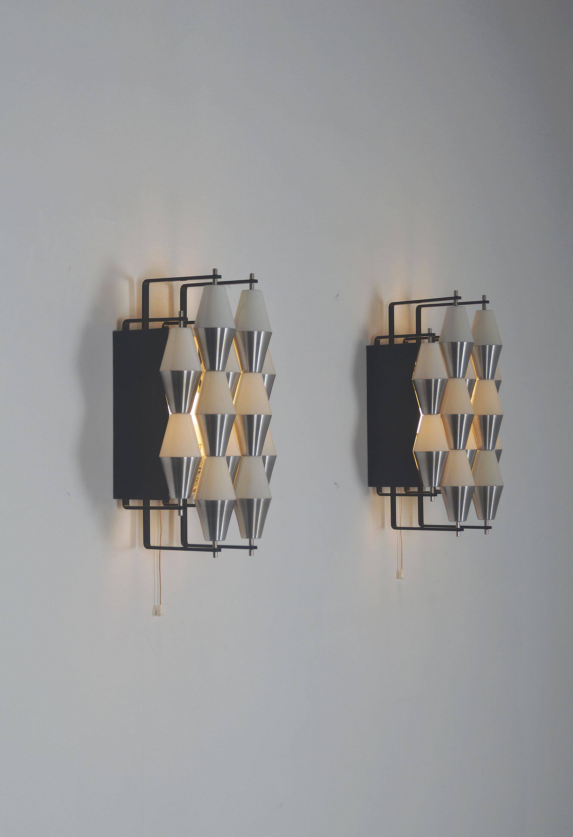 Rare set of wall lamps 'ludiek' by raak, 1960s