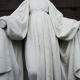 Ancienne statuette de la vierge au serpent en biscuit