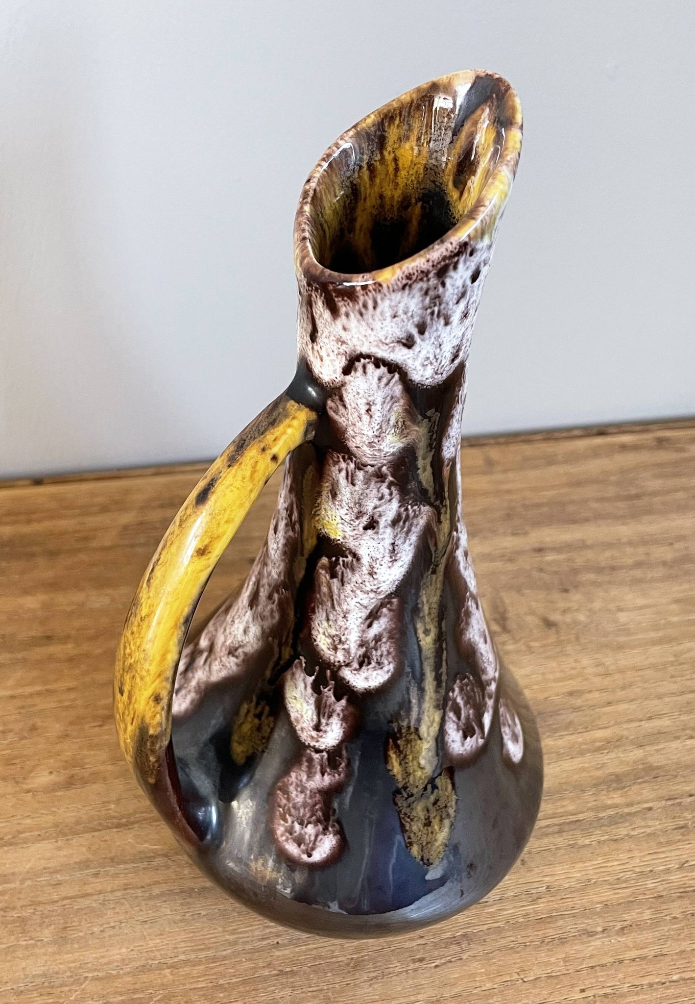 Fat lava style vase with handle, victory, purple, yellow & black drip glaze