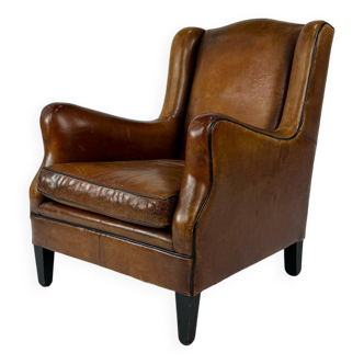 Fauteuil club en cuir de mouton, années 1970