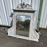 Large decorative mirror in carved wood with shabby patina