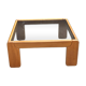 Coffee table from Regain in solid elm with a smoked glass top.