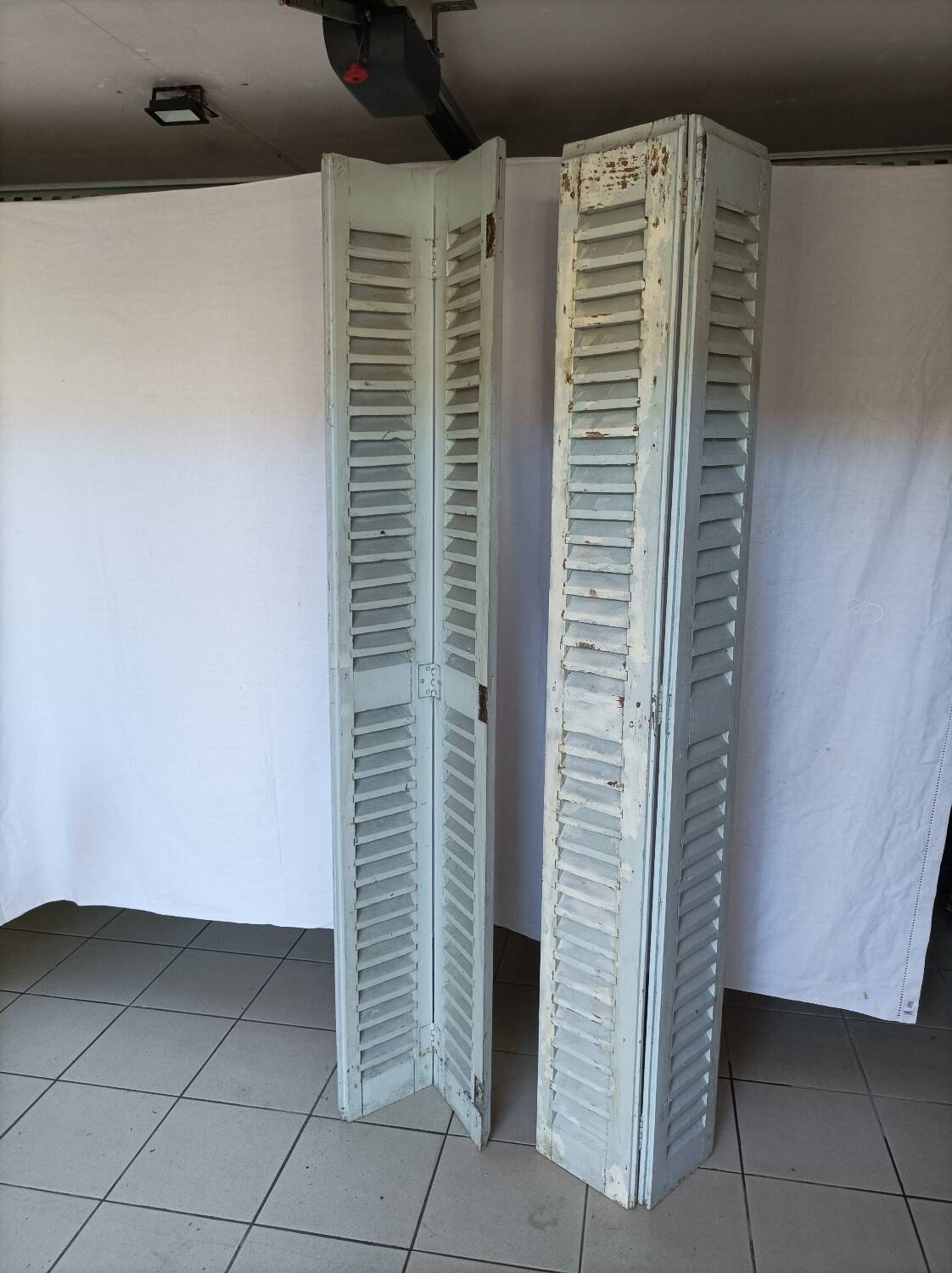 Louvered wooden shutter
