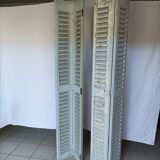 Louvered wooden shutter
