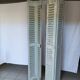 Louvered wooden shutter