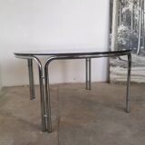 Round chrome and smoked glass coffee table