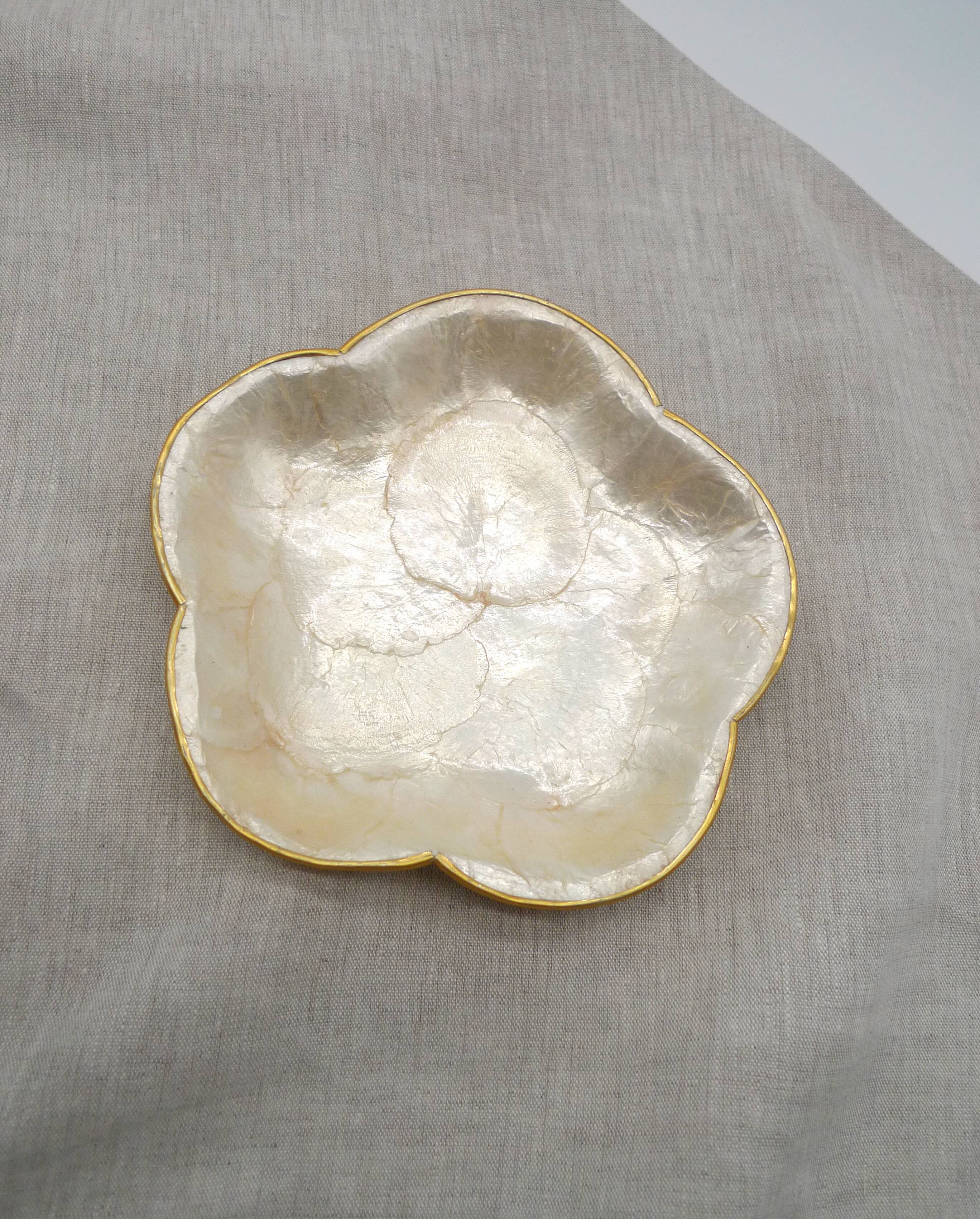 Empty pocket in mother-of-pearl and brass