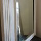 Beveled fireplace mirror