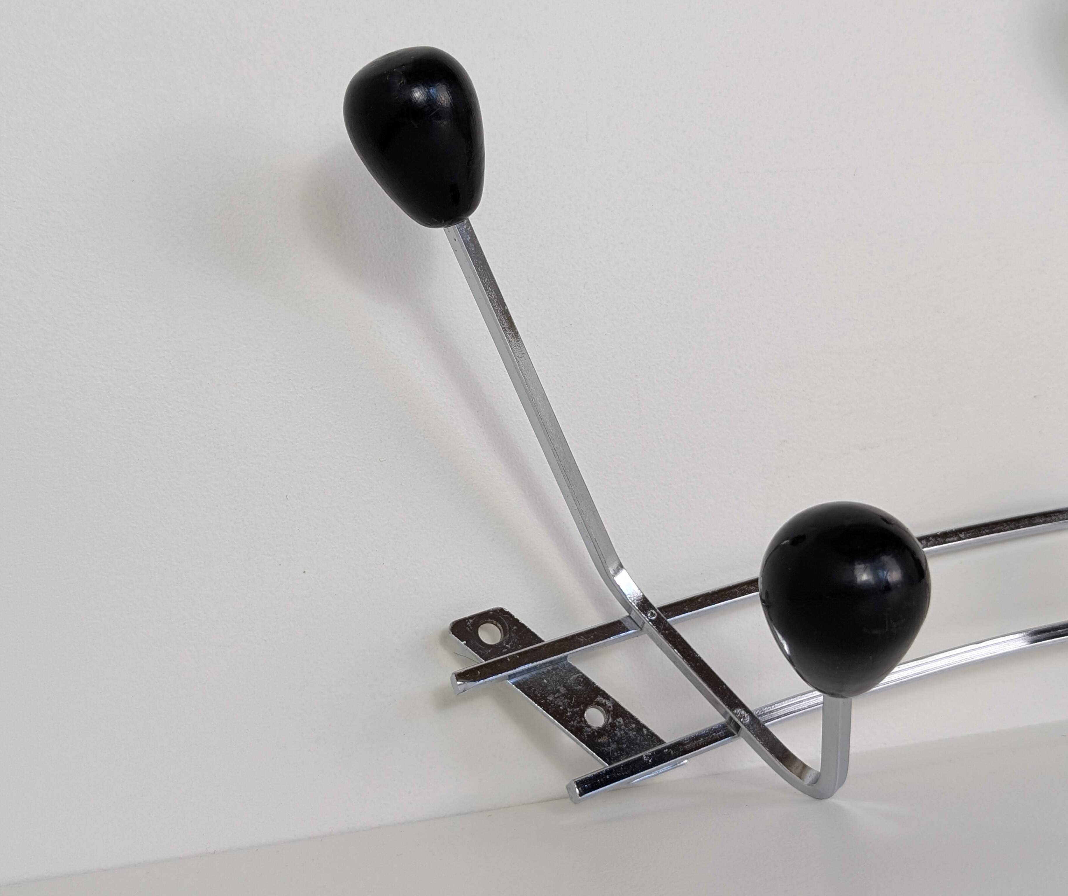 Chrome wall-mounted coat rack